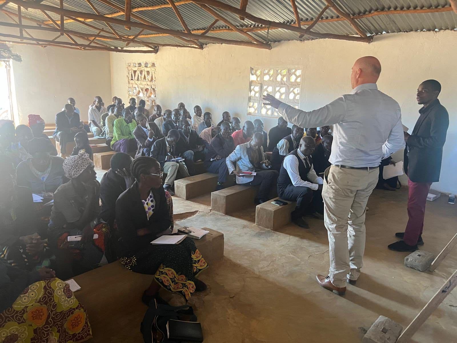 Lars teaching packed church