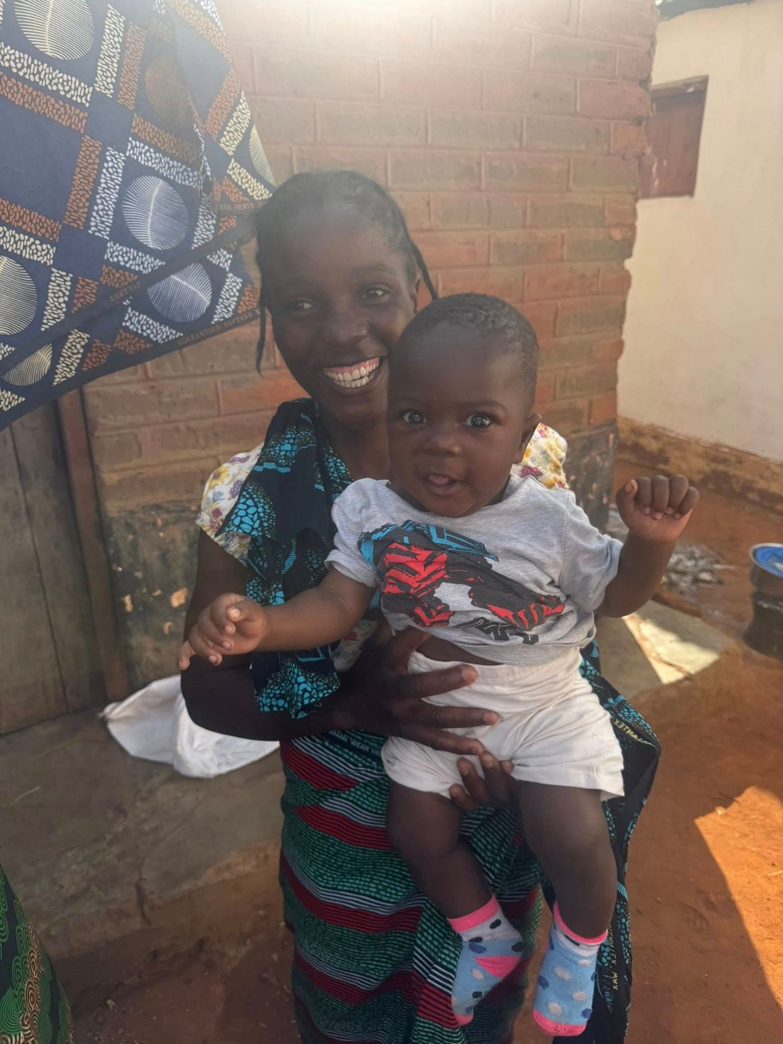 Mother and child smiling