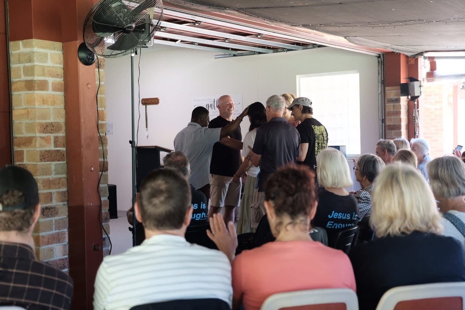 People gathered in prayer